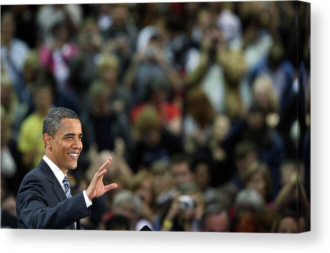 Democracy Canvas Print featuring the photograph Barack Obama Campaigns In Golden by John Moore