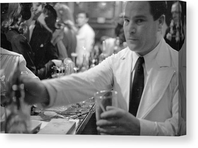 England Canvas Print featuring the photograph Barman by Bert Hardy