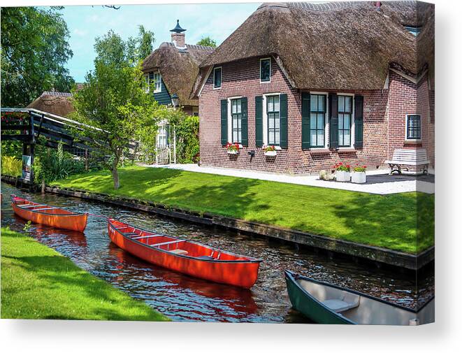 Jenny Rainbow Fine Art Photography Canvas Print featuring the photograph Boats in a Row. Giethoorn. The Netherlands by Jenny Rainbow