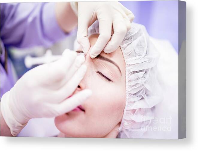 Aesthetic Medicine Canvas Print featuring the photograph Botox Injection In Forehead by Science Photo Library