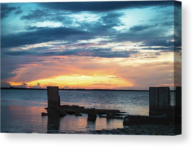 Clouds Canvas Print featuring the photograph Broken Sunset by Joe Leone