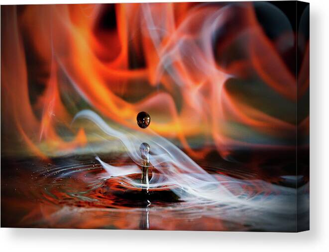 Macro Canvas Print featuring the photograph Burning Drop by Alberto Ghizzi Panizza