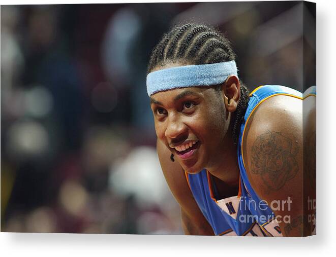 Carmelo Anthony of the Denver Nuggets smiles during the game