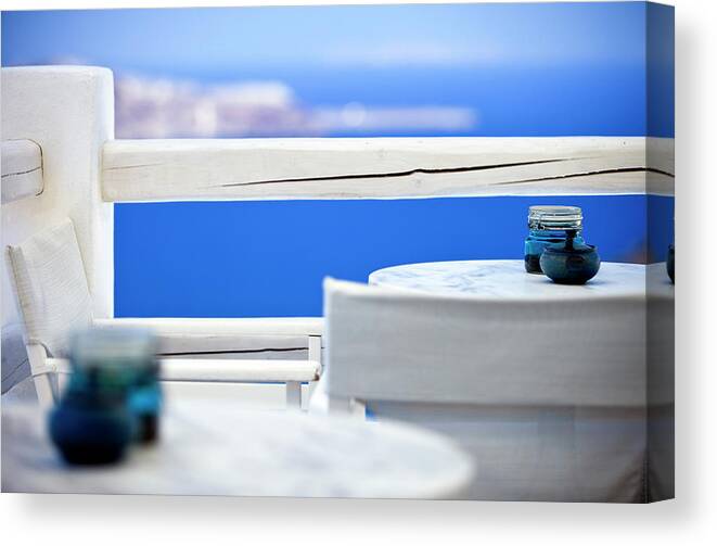 Greek Culture Canvas Print featuring the photograph Chairs And Table by Mbbirdy
