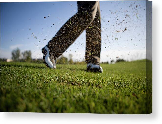 Young Men Canvas Print featuring the photograph Close-up Of Golfers Swing by Lane Oatey