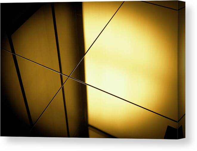 Shadow Canvas Print featuring the photograph Close-up Spot Lit Reflection In Yellow by Ralf Hiemisch
