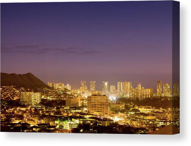 Scenics Canvas Print featuring the photograph Colorful Honolulu Twilight Skyline by Mlenny