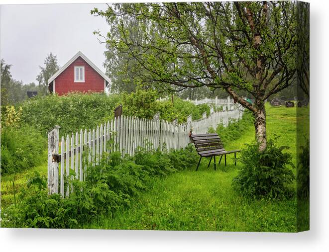 Fence Canvas Print featuring the photograph Cottage in the Rain by Debra and Dave Vanderlaan