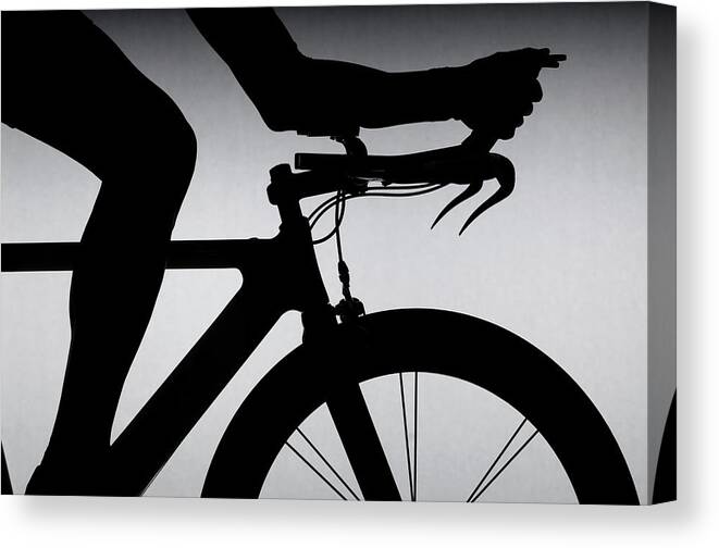 Aerodynamic Canvas Print featuring the photograph Cyclist With Time Trial Bicycle by Romilly Lockyer