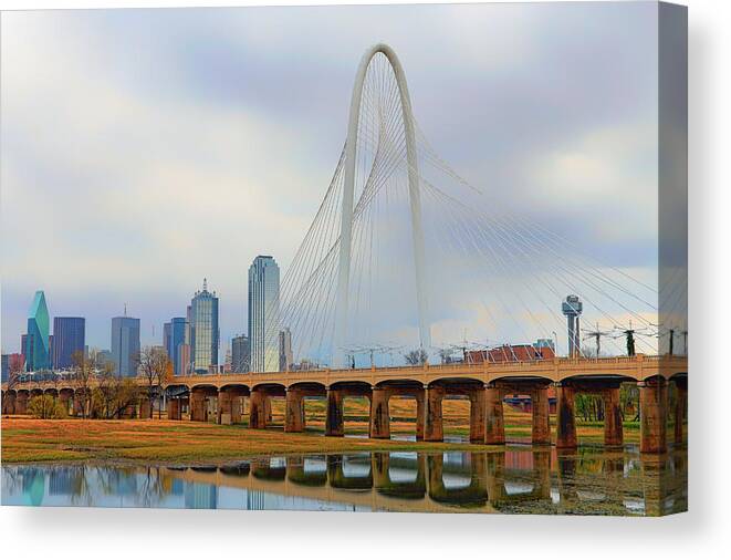 Dallas Skyline Canvas Print featuring the photograph Dallas Skyline with the Margaret Hunt Hill Bridge - Texas - Cityscape by Jason Politte
