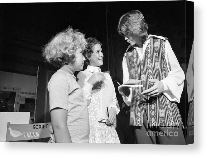 Child Canvas Print featuring the photograph David Cassidy Signing Autographs by Bettmann