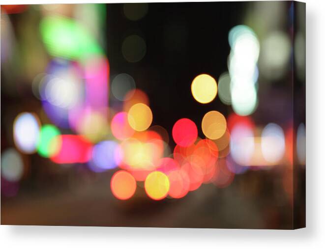 Funky Canvas Print featuring the photograph Defocused Light Dots At Times Square In by Sebastian-julian