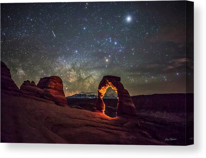 Arches National Park Canvas Print featuring the photograph Delicate Arch and the Milky Way by Dan Norris