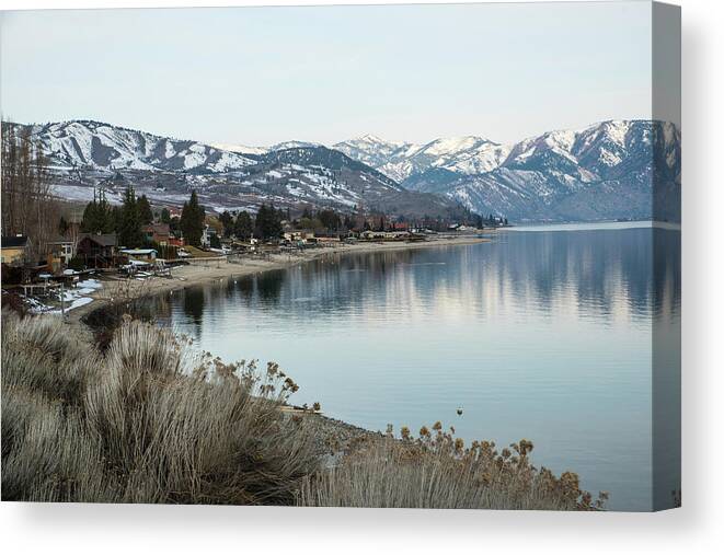 Early Spring Lake Chelan Reflections Canvas Print featuring the photograph Early Spring Lake Chelan Reflections by Tom Cochran