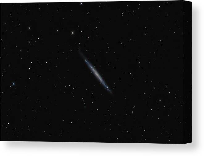 Comet Canvas Print featuring the photograph Edge On Galaxy by Manfred konrad