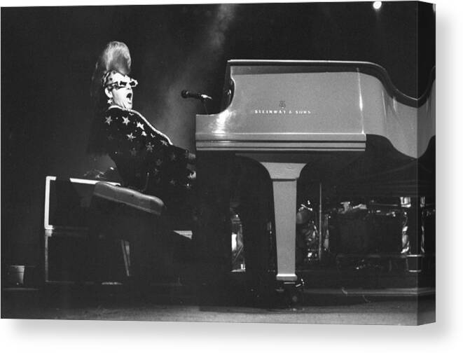 Elton John Canvas Print featuring the photograph Elton John Sings At A Concert At by New York Daily News Archive