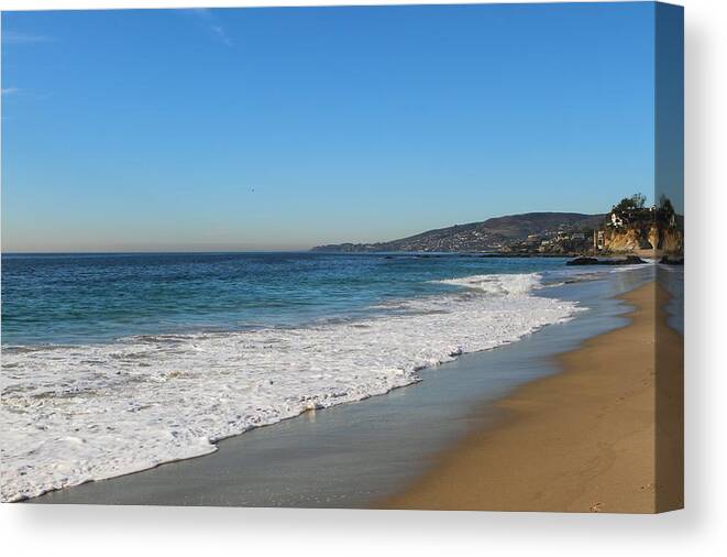 Water's Edge Canvas Print featuring the photograph Empty Beach by Behindthelens