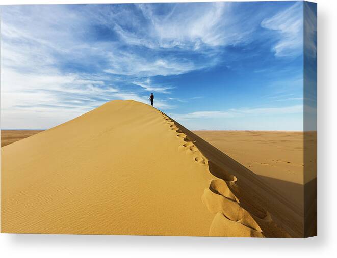 Scenics Canvas Print featuring the photograph Female Tourist Standing On The Top Of by Hadynyah