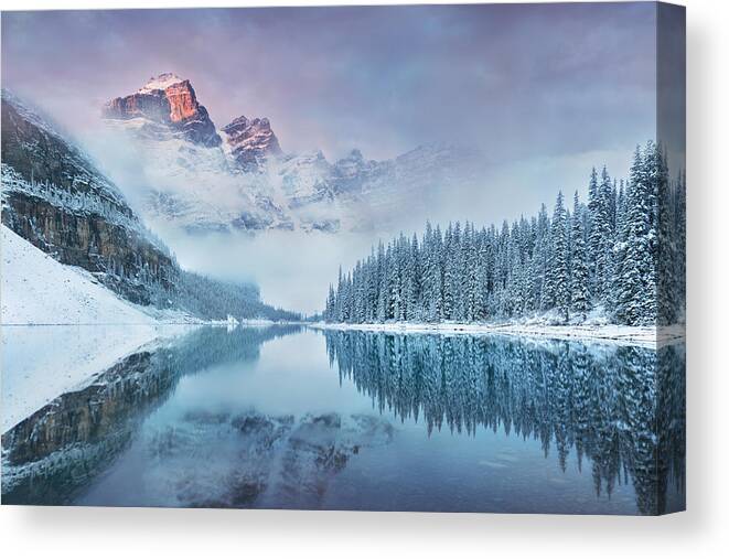 Landscapes Canvas Print featuring the photograph First Snow Morning At Moraine Lake by Michal Balada