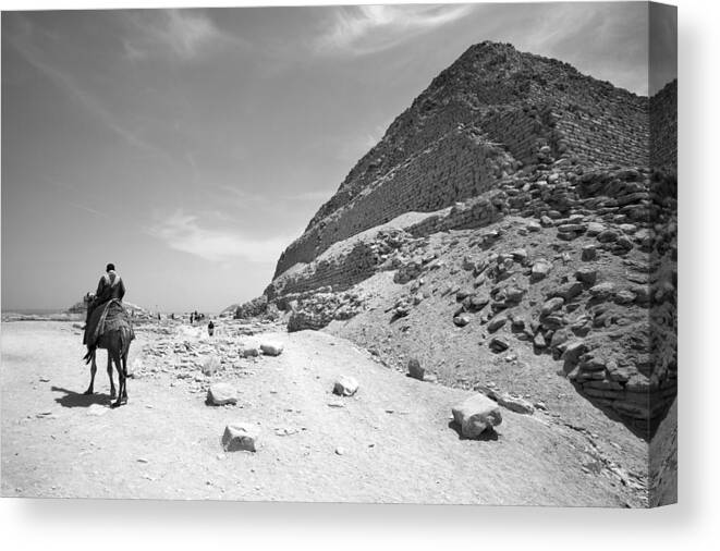 Step Pyramid Of Zoser Canvas Print featuring the photograph First Stepped Pyramid With Camel Rider by David Clapp