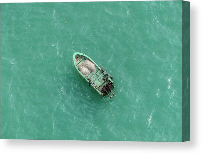 Outdoors Canvas Print featuring the photograph Fishing Boat Moored Off Coast, Sanya by Paul Todd