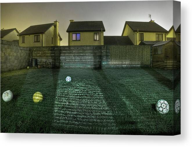 Five Footballs Canvas Print featuring the photograph Five Footballs by Geoffrey Ansel Agrons