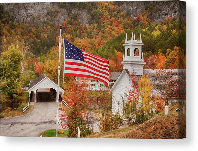 Autumn Canvas Print featuring the photograph Flag flying over the Stark covered Bridge by Jeff Folger