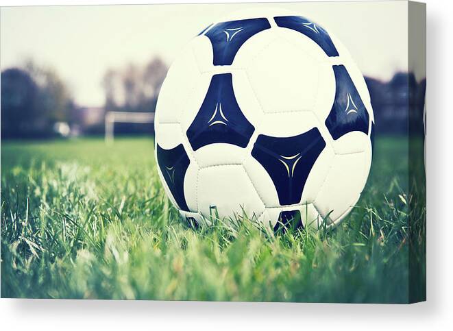 Grass Canvas Print featuring the photograph Football by Sally Anscombe