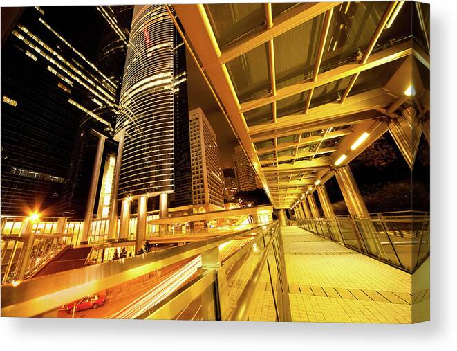 Chinese Culture Canvas Print featuring the photograph Footbridge At Night In A Big City by Laoshi