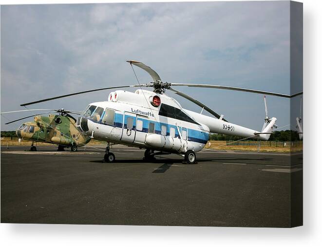 Horizontal Canvas Print featuring the photograph Former East German Air Force Mi-8s by Timm Ziegenthaler