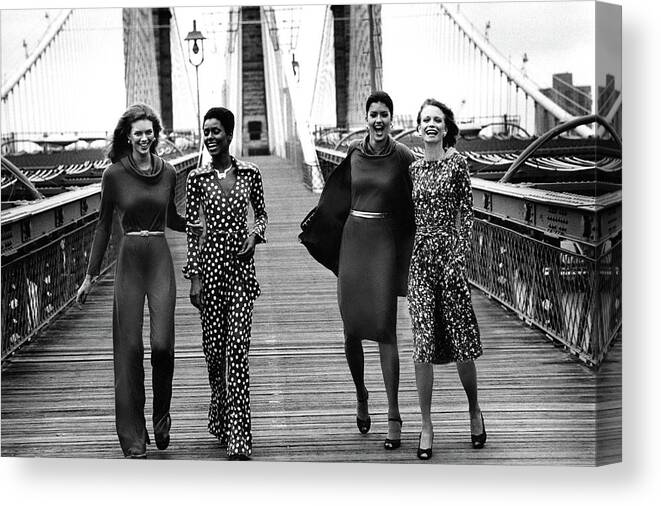#new2022vogue Canvas Print featuring the photograph Four Models On A Bridge Wearing Diane Von by Mike Reinhardt