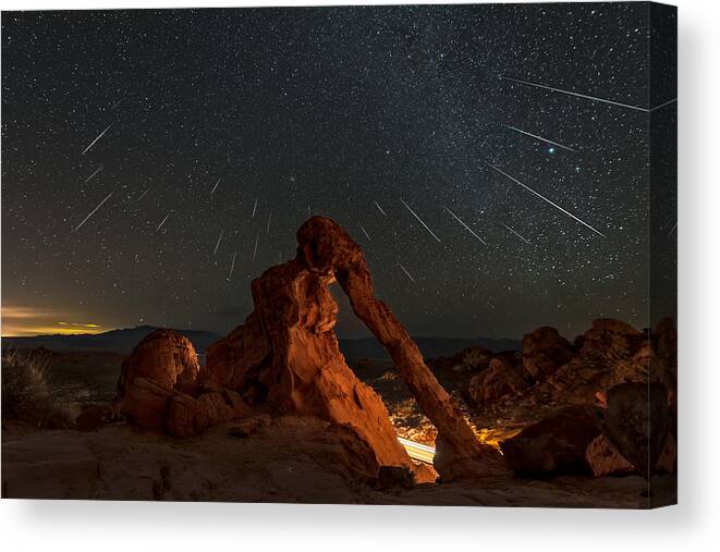 Geminid Canvas Print featuring the photograph Geminid Meteor Shower Above The Elephant Rock by Hua Zhu