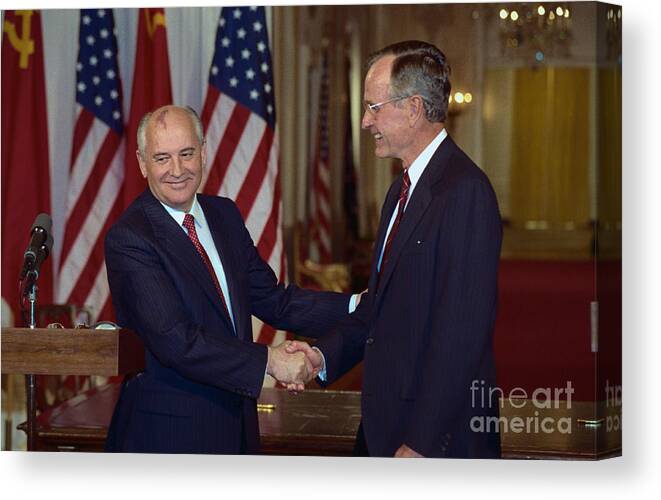 People Canvas Print featuring the photograph George Bush And Mikhail Gorbachev by Bettmann