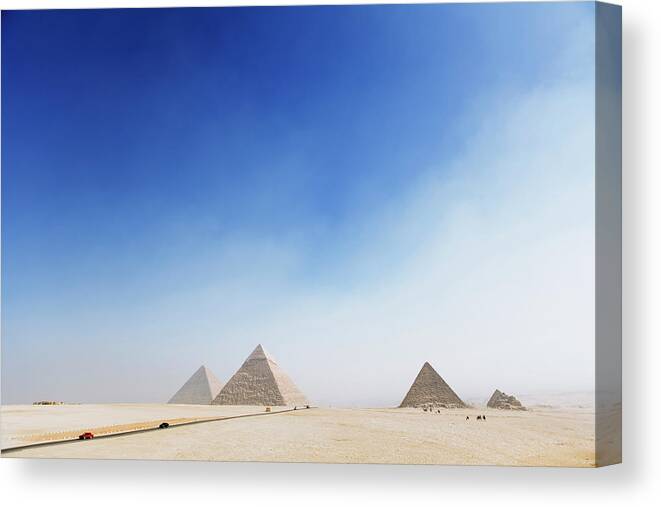 Clear Sky Canvas Print featuring the photograph Giza Pyramids by Roine Magnusson