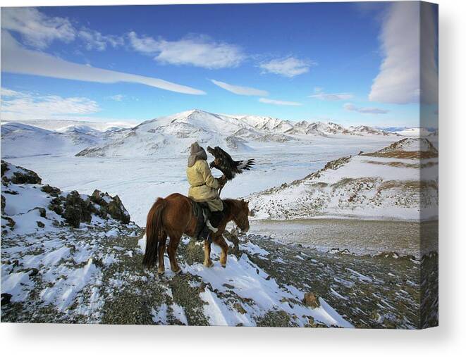 Horse Canvas Print featuring the photograph Golden Eagle Hunter Riding In Altai by Timothy Allen
