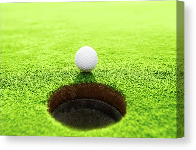 Shadow Canvas Print featuring the photograph Golf Ball by Orbon Alija