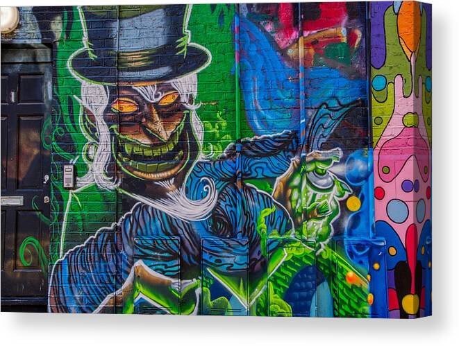 Graffiti Canvas Print featuring the photograph Graffiti Art Painting of Phantom Paint Sprayer by Raymond Hill