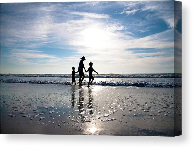 4-5 Years Canvas Print featuring the photograph Grandmother And Grandsons Walkng On The by Chris Stein