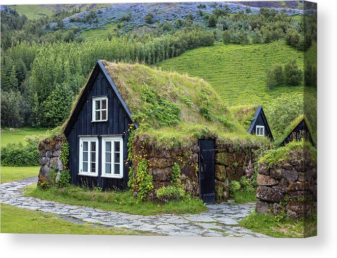 Iceland Canvas Print featuring the photograph Grass Roof Cottages at the Skogar Folk Museum of Iceland by Pierre Leclerc Photography