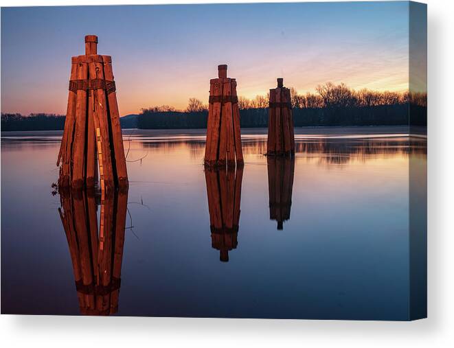 Rocky Hill Canvas Print featuring the photograph Group of three docking piles on Connecticut river by Kyle Lee