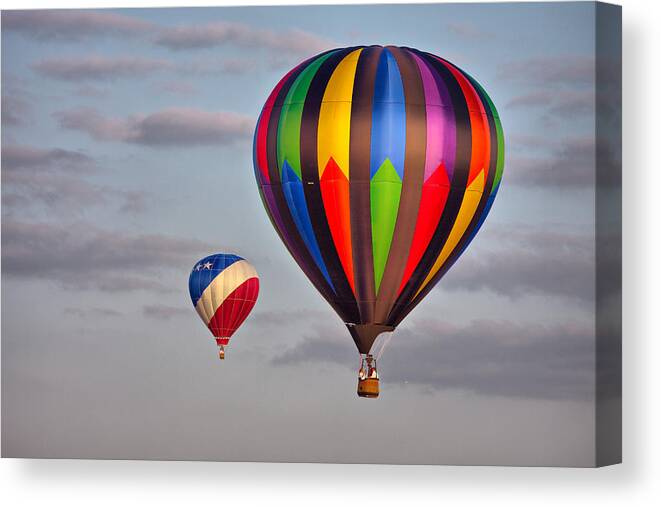 Hot Air Balloon Canvas Print featuring the photograph Hot Air Balloon Race - The Chase by Photo By Claudia Domenig