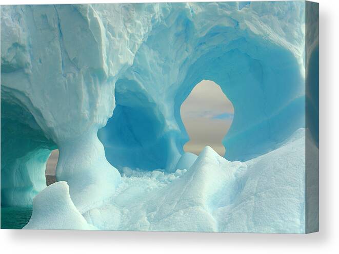 Scenics Canvas Print featuring the photograph Iceberg With Arches, Antarctic Peninsula by Eastcott Momatiuk