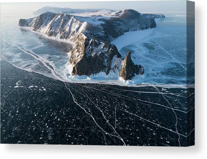 Cracks Canvas Print featuring the photograph Icy Cliffs At Dawn From An Aerial Point Of View by Cavan Images