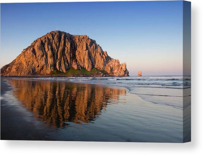 Dawn Canvas Print featuring the photograph Image Of Morro Rock And Its Reflection by Jftringali