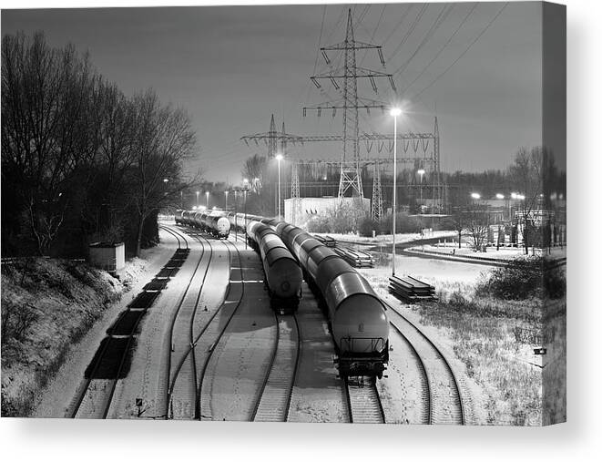 Snow Canvas Print featuring the photograph Industry Railroad Yard At Night by Michaelutech