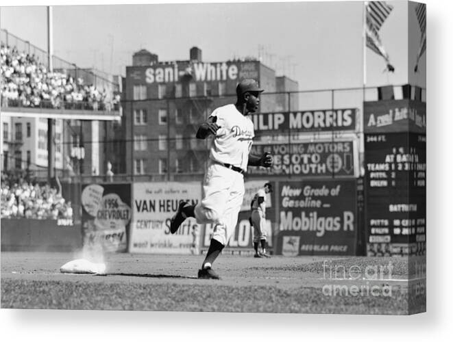 1950-1959 Canvas Print featuring the photograph Jackie Robinson Rounds The Bases by Robert Riger