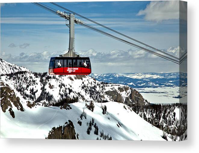 Jackson Hole Tram Canvas Print featuring the photograph Jackson Hole Aerial Tram Over The Snow Caps by Adam Jewell