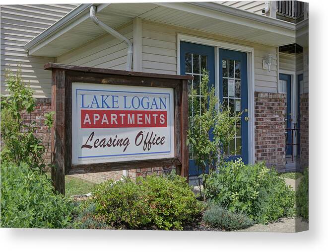 Sign Canvas Print featuring the photograph Lake Logan apartments sign by Jeff Kurtz