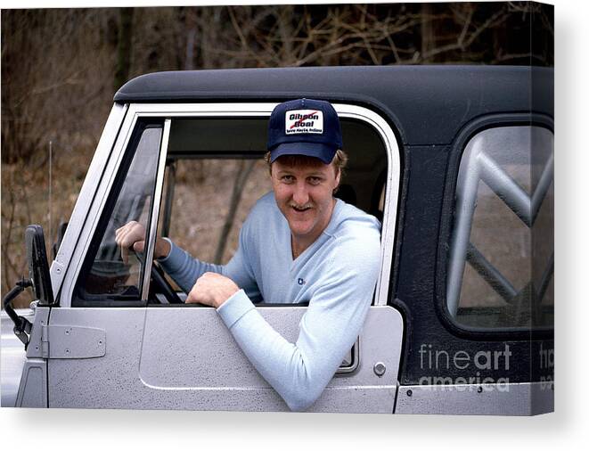1980-1989 Canvas Print featuring the photograph Larry Bird Poses In His Truck by Ken Regan