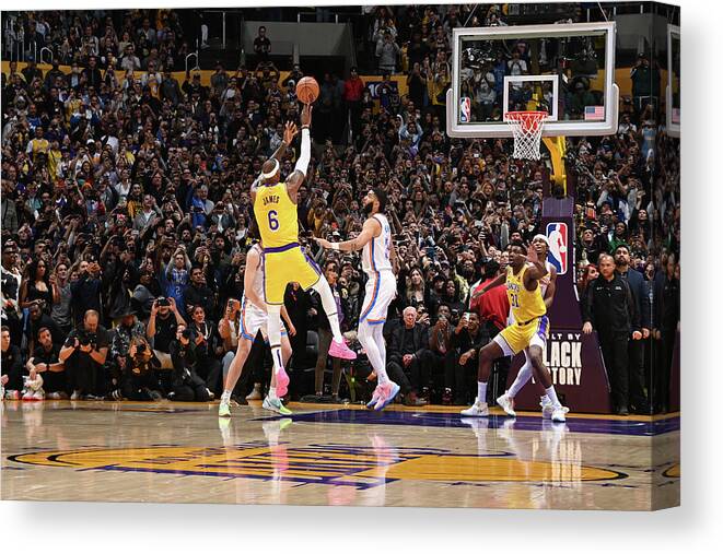 Lebron James Canvas Print featuring the photograph LeBron James Shoots to Break the All-Time Scoring Record by Andrew D. Bernstein